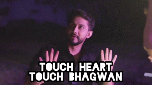 A Man Making A Funny Face With The Words Touch Heart Touch Bhagwan Above Him GIF