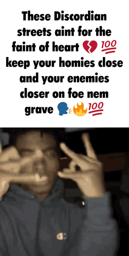 A Man Making A Peace Sign In Front Of A Sign That Says These Discordian Streets GIF