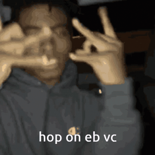 A Man Making A Peace Sign With His Hands And The Words Hop On Eb Vc GIF
