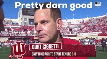 A Man On A Football Field Is Being Interviewed By Curt Cignetti GIF