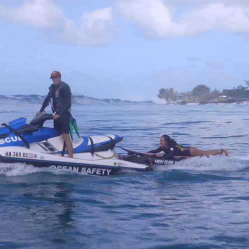 A Man On A Jet Ski With The Word Ocean Safety On It GIF