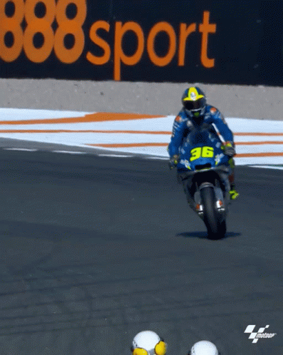 A Man On A Motorcycle With The Number 36 On The Front GIF