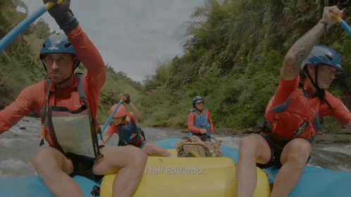 A Man On A Raft Says " I Tell Eduardo " On The Side GIF
