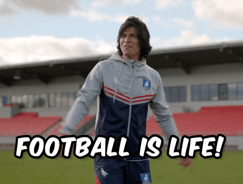 A Man On A Soccer Field With The Words " Football Is Life " Written Below Him GIF