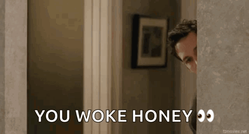 A Man Peeking Out From Behind A Door With The Words You Woke Honey Written On It GIF
