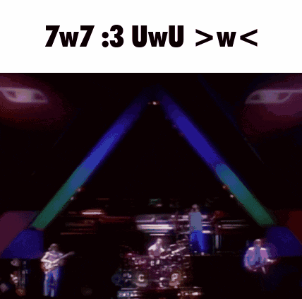 A Man Playing A Guitar And Singing Into A Microphone With The Words 7W7 3 Uwu > W < Below Him GIF