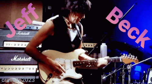 A Man Playing A Guitar Next To A Marshall Amp GIF