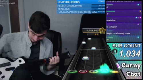 A Man Playing A Guitar On A Screen That Says Sub Count 1,034 GIF