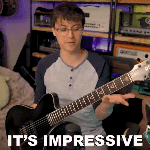 Guitar Player Saying It's Impressive GIF