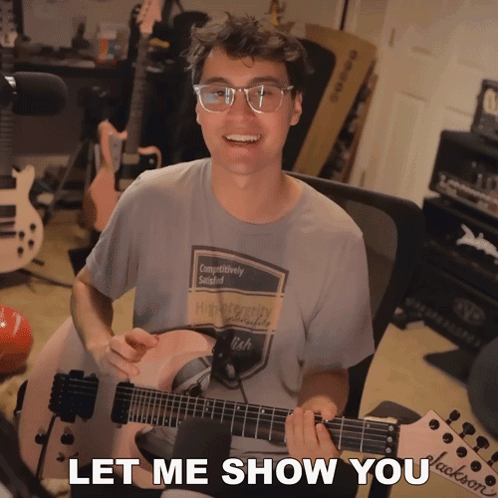 Guitar Player With Let Me Show You Text GIF