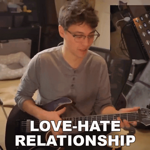 Guitarist With Love-Hate Relationship Text GIF