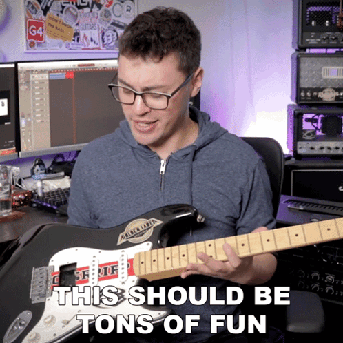 A Man Playing A Guitar With The Words " This Should Be Tons Of Fun " Written Below Him GIF
