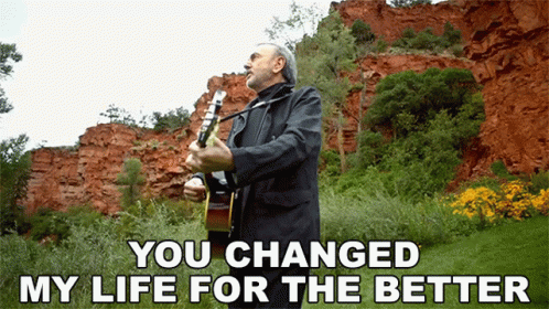A Man Playing A Guitar With The Words You Changed My Life For The Better GIF