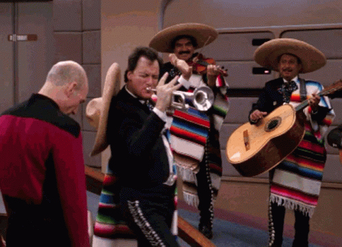 a man playing a trumpet and a man playing guitar