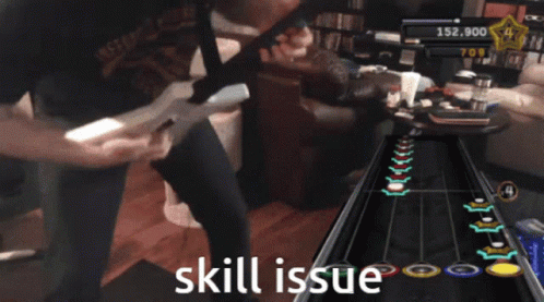 A Man Playing A Video Game With The Words Skill Issue Written On The Bottom GIF