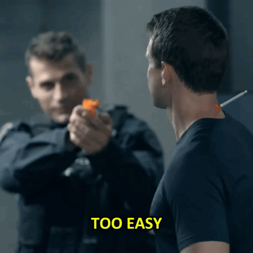 A Man Pointing A Gun At Another Man With The Words Too Easy Visible GIF