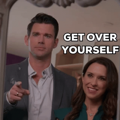 A Man Pointing At A Woman With The Words Get Over Yourself GIF