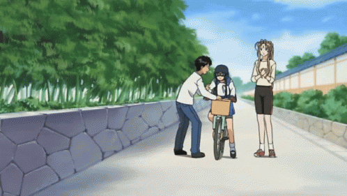 A Man Pushes A Girl On A Bicycle While A Woman Looks On GIF