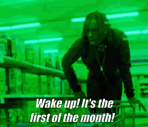 A Man Pushing A Shopping Cart With The Words Wake Up It 'S The First Of The Month Written Below Him GIF