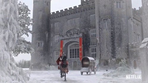 A Man Riding A Horse In Front Of A Castle With The Word Netflix On The Bottom GIF