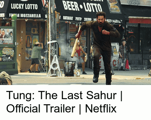 A Man Running Down A Street In Front Of A Beer Lotto GIF
