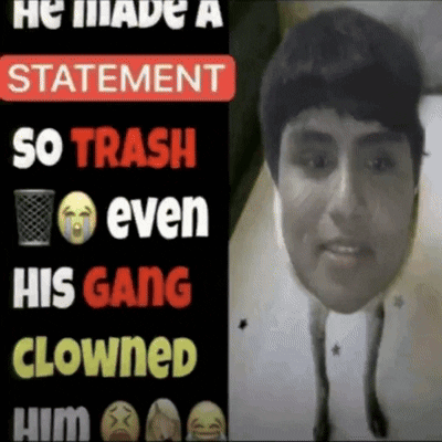 A Man 'S Face Is Behind A Sign That Says He Made A Statement So Trash Even His Gang Clowns Him GIF