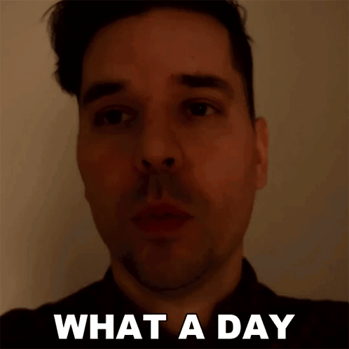 A Man 'S Face Is Shown With The Words What A Day Below It GIF