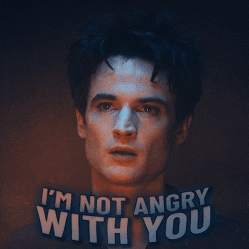 A Man 'S Face With The Words I 'M Not Angry With You Behind Him GIF