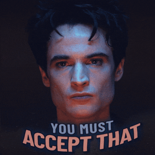 A Man 'S Face With The Words " You Must Accept That " Behind Him GIF