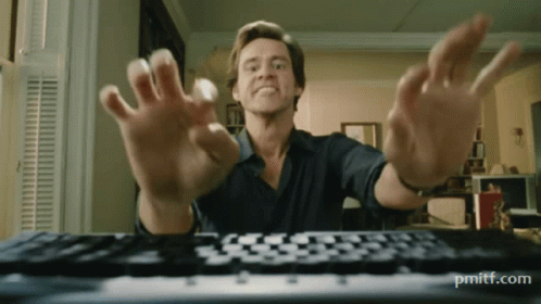 A Man 'S Hands Are Reaching Out Towards A Keyboard With Pmittf.com In The Lower Right Corner GIF