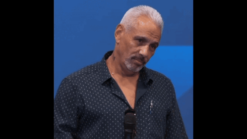 A Man Says " A Day Of Love " While Looking Down GIF