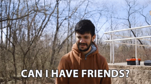 A Man Says " Can I Have Friends " In Front Of A Forest GIF