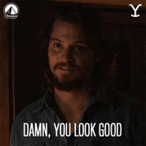 A Man Says Damn You Look Good In Front Of A Yellowstone Logo GIF