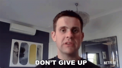 A Man Says " Do N't Give Up " While Looking At The Camera GIF