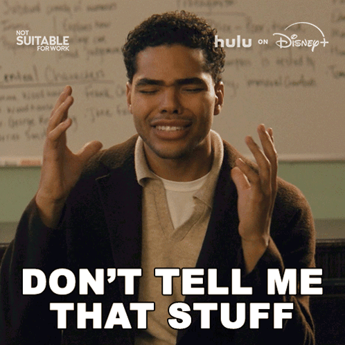 a man says " don 't tell me that stuff " while sitting in front of a white board