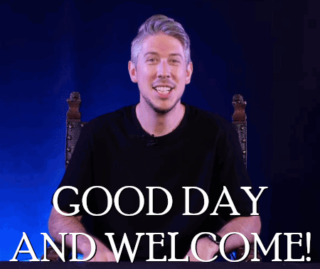 A Man Says Good Day And Welcome With His Hands Up In The Air GIF