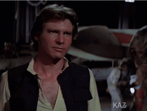 A Man Says Han May The Force Be With You In Yellow Letters GIF