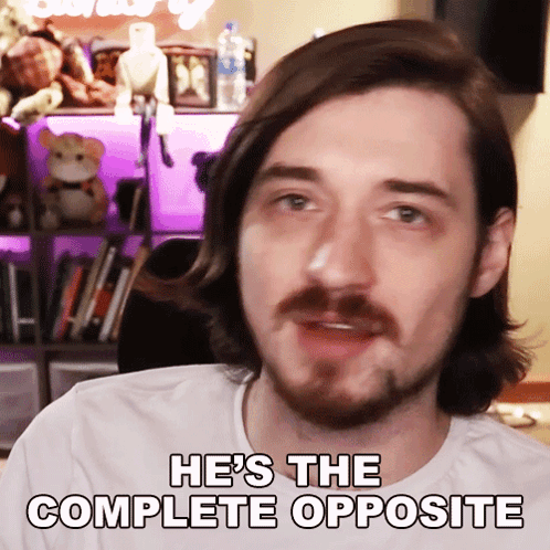 a man says he 's the complete opposite in a white shirt