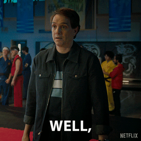 A Man Says Here We Go Again In Front Of A Crowd Of People GIF