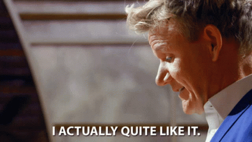 A Man Says I Actually Quite Like It In Front Of A Staircase GIF