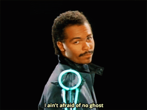 A Man Says I Ain 'T Afraid Of No Ghost In A Black Background GIF