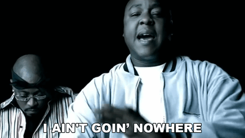 A Man Says I Ain 'T Goin ' Nowhere While Another Man Looks On GIF
