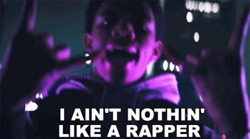 A Man Says I Ain 'T Nothin ' Like A Rapper In Front Of A Blurry Background GIF