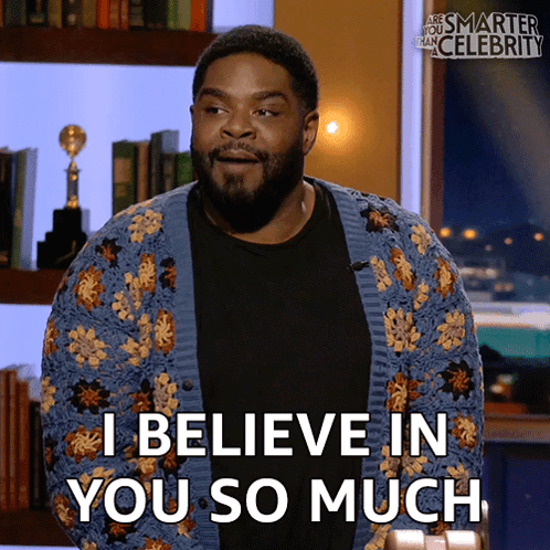 A Man Says I Believe In You So Much While Wearing A Floral Cardigan GIF