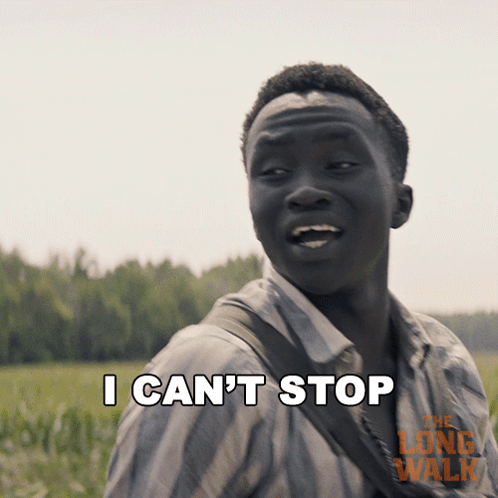 A Man Says " I Can 'T Stop " In Front Of A Poster For The Long Walk GIF