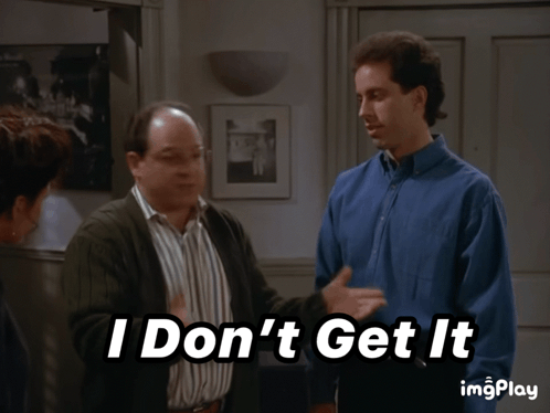 A Man Says " I Don 'T Get It " While Standing Next To A Woman GIF