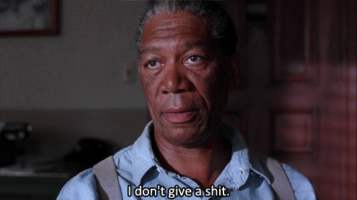 A Man Says " I Don 'T Give A Shit " In Front Of A Door GIF