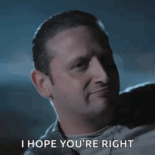 A Man Says " I Hope You 'Re Right " While Smiling GIF