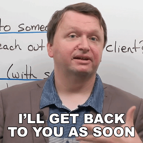 A Man Says " I 'Ll Get Back To You As Soon " In Front Of A White Board GIF