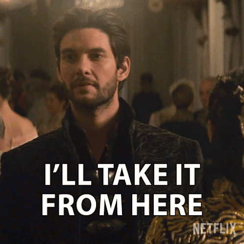 A Man Says " I 'Ll Take It From Here " In Front Of A Crowd Of People GIF